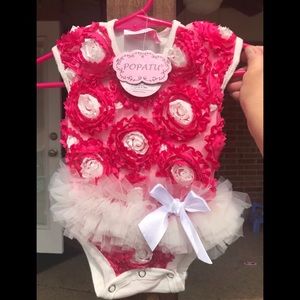Floral ruffled onesie-brand new!